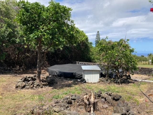94-1790 Kaulua St, Naalehu, HI 96772 - view of yard featuring an outbuilding