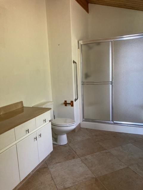 94-1790 Kaulua St, Naalehu, HI 96772 - full bathroom with vaulted ceiling, vanity, and a shower with door