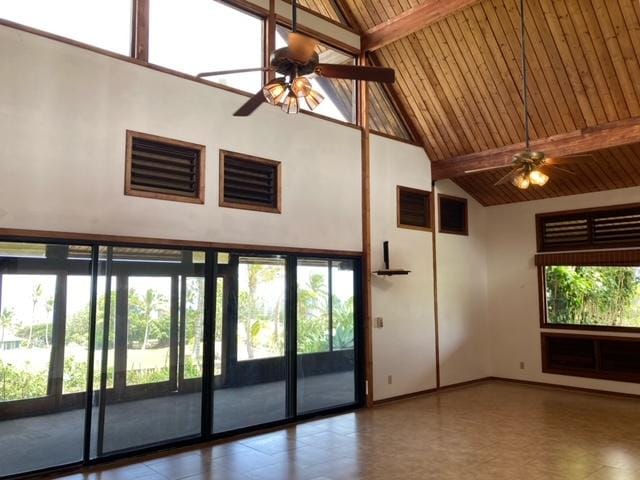 94-1790 Kaulua St, Naalehu, HI 96772 - empty room featuring high vaulted ceiling, ceiling fan, and a wood ceiling with exposed beams