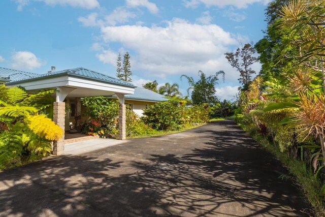 73-4571 Kukuki St Unit A, Kailua-Kona, HI 96740 - view of asphalt driveway