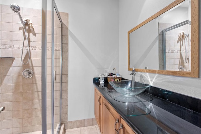 73-4571 Kukuki St Unit A, Kailua-Kona, HI 96740 - full bathroom with a stall shower, vanity, and tile patterned flooring