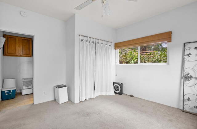 73-4571 Kukuki St Unit A, Kailua-Kona, HI 96740 - unfurnished bedroom featuring carpet floors and a ceiling fan