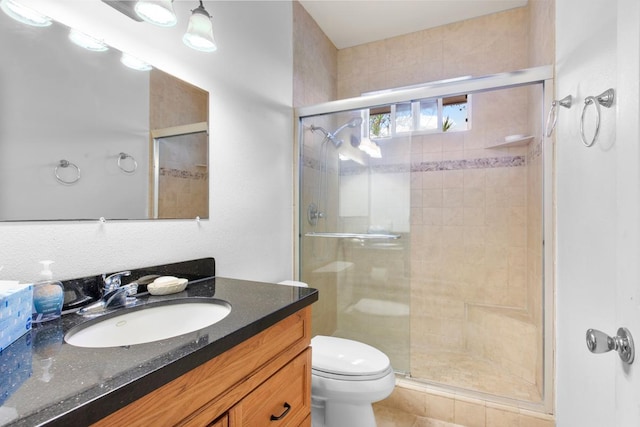 73-4571 Kukuki St Unit A, Kailua-Kona, HI 96740 - bathroom featuring toilet, vanity, and a stall shower