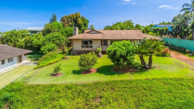 3875 Gallo Pl, Kalaheo, HI 96741 - view of front facade featuring a chimney and stone siding