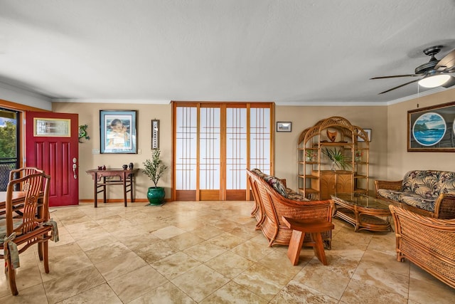 3875 Gallo Pl, Kalaheo, HI 96741 - living area featuring ornamental molding, a ceiling fan, and baseboards