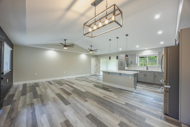 15-1674 24th Ave, Keaau, HI 96749 - kitchen with freestanding refrigerator, a sink, a ceiling fan, a kitchen island, and open floor plan