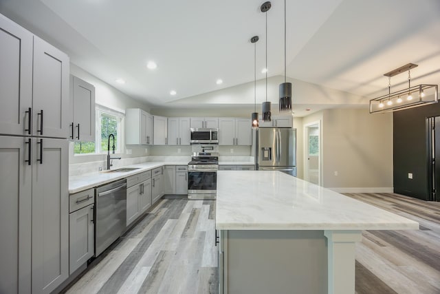 15-1674 24th Ave, Keaau, HI 96749 - kitchen with appliances with stainless steel finishes, a sink, gray cabinets, light wood finished floors, and vaulted ceiling