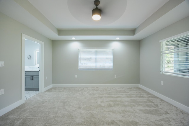 15-1674 24th Ave, Keaau, HI 96749 - empty room featuring light colored carpet, a raised ceiling, baseboards, and recessed lighting