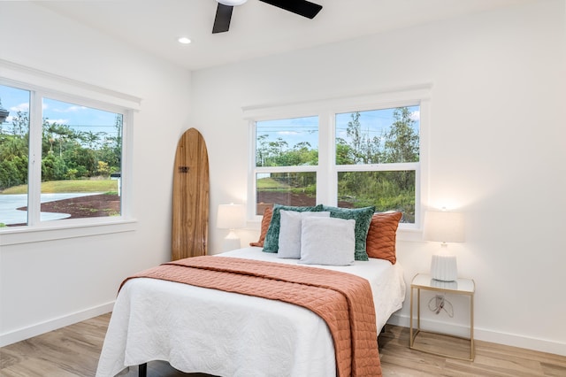 15-1893 22nd Ave, Keaau, HI 96749 - bedroom featuring multiple windows, baseboards, light wood finished floors, a ceiling fan, and recessed lighting