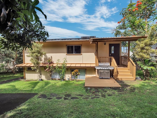 74-5156 Kialoa Pl, Kailua-Kona, HI 96740 - rear view of property featuring a lawn