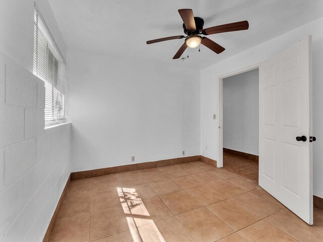 74-5156 Kialoa Pl, Kailua-Kona, HI 96740 - unfurnished room with ceiling fan, light tile patterned floors, and baseboards