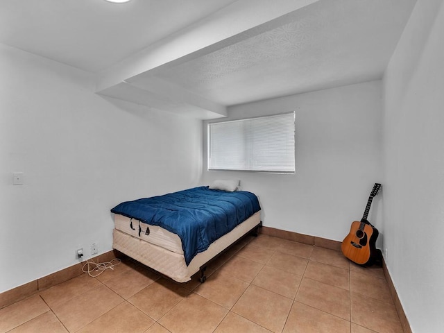 74-5156 Kialoa Pl, Kailua-Kona, HI 96740 - bedroom featuring baseboards and light tile patterned floors