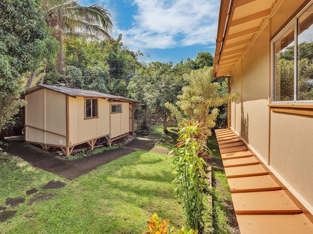 74-5156 Kialoa Pl, Kailua-Kona, HI 96740 - view of green lawn featuring an outbuilding and stairs