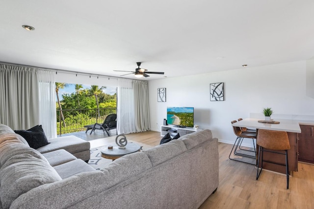 78-7070 Alii Dr Unit B202, Kailua-Kona, HI 96740 - living room with a ceiling fan and light wood-style floors