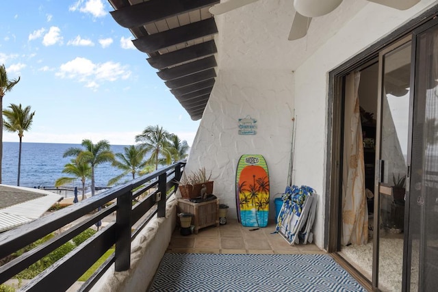 75-6082 Alii Dr # B333, Kailua-Kona, HI 96740 - balcony featuring a water view and ceiling fan