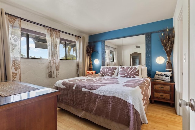 75-6082 Alii Dr # B333, Kailua-Kona, HI 96740 - bedroom with light wood-style flooring