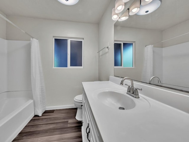 74-5071 Kealapua St, Kailua-Kona, HI 96740 - full bathroom with vanity, toilet, shower / bath combination with curtain, baseboards, and wood finished floors