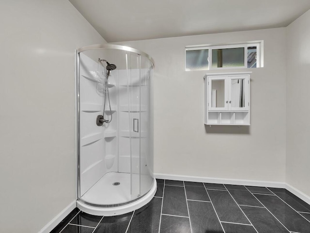 74-5071 Kealapua St, Kailua-Kona, HI 96740 - full bathroom with a stall shower, baseboards, and tile patterned floors