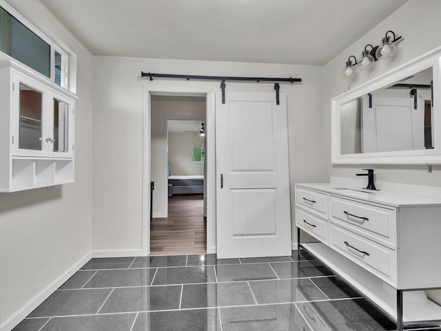 74-5071 Kealapua St, Kailua-Kona, HI 96740 - bathroom featuring baseboards, vanity, tile patterned floors, and ceiling fan