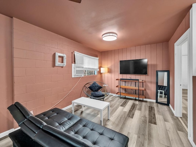 74-5071 Kealapua St, Kailua-Kona, HI 96740 - living area with light wood-style flooring and baseboards