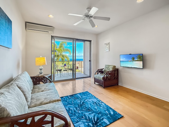 75-346 Hualalai Rd Unit B202, Kailua-Kona, HI 96740 - living room featuring an AC wall unit, wood finished floors, recessed lighting, and ceiling fan