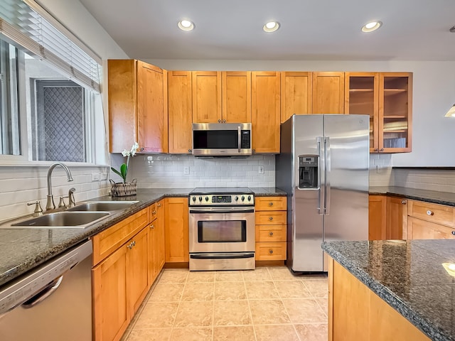 75-346 Hualalai Rd Unit B202, Kailua-Kona, HI 96740 - kitchen with stainless steel appliances, tasteful backsplash, glass insert cabinets, recessed lighting, and light tile patterned floors