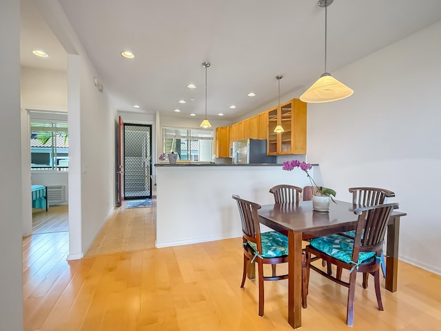 75-346 Hualalai Rd Unit B202, Kailua-Kona, HI 96740 - dining space featuring light wood finished floors and recessed lighting