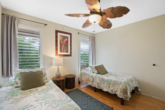 4461 Kamoa Rd Unit B22, Kapaa, HI 96746 - bedroom featuring wood finished floors, baseboards, and ceiling fan