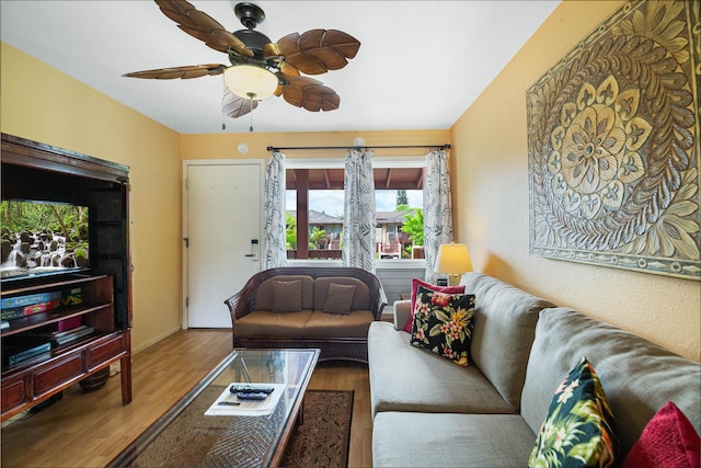 4461 Kamoa Rd Unit B22, Kapaa, HI 96746 - living room featuring wood finished floors and ceiling fan