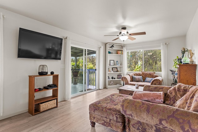 11-3458 Lehua St, Mountain View, HI 96771 - living area featuring a ceiling fan and light wood finished floors