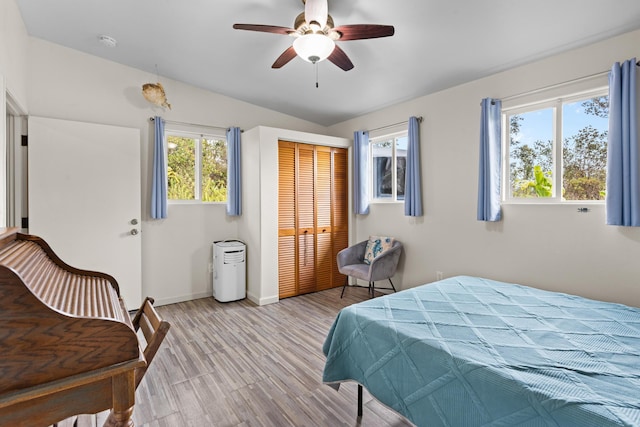 11-3458 Lehua St, Mountain View, HI 96771 - bedroom featuring a closet, light wood finished floors, baseboards, and a ceiling fan