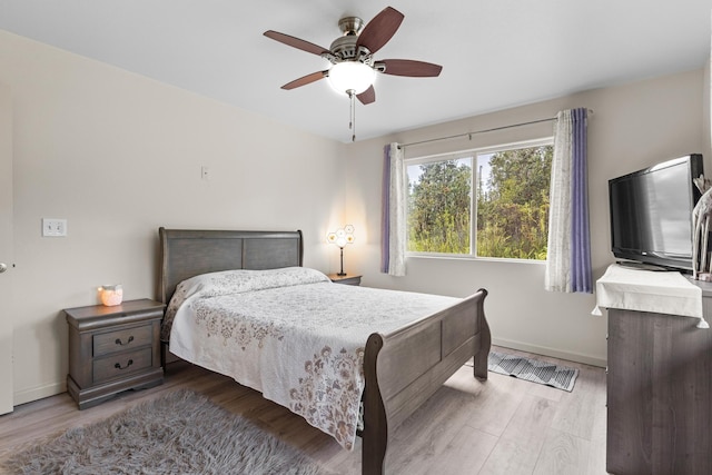 11-3458 Lehua St, Mountain View, HI 96771 - bedroom featuring wood finished floors, baseboards, and a ceiling fan