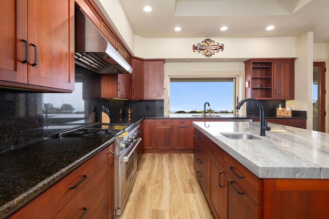 73-1138 Hamo St, Kailua-Kona, HI 96740 - kitchen featuring stainless steel range, a sink, wall chimney range hood, recessed lighting, and light wood-style floors