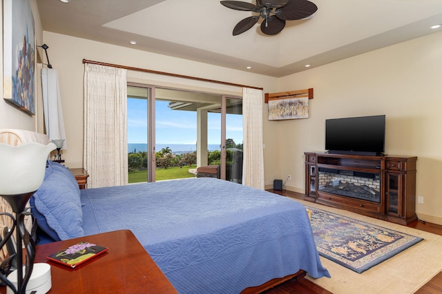 73-1138 Hamo St, Kailua-Kona, HI 96740 - bedroom with access to exterior, recessed lighting, wood finished floors, baseboards, and ceiling fan