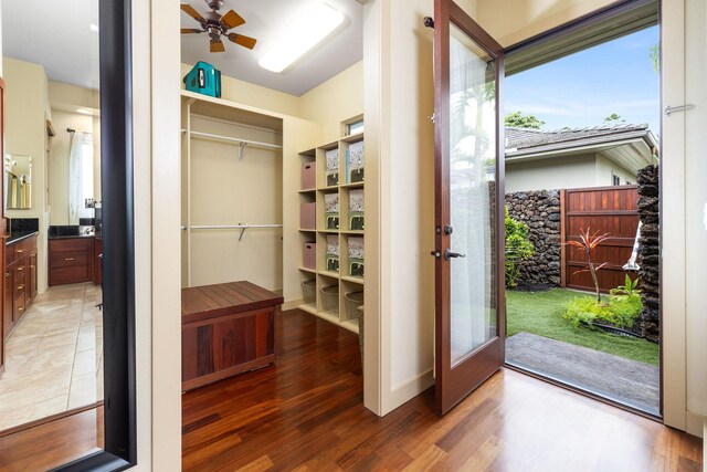 73-1138 Hamo St, Kailua-Kona, HI 96740 - walk in closet with wood finished floors, french doors, and a ceiling fan