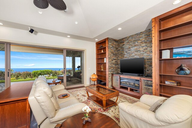 73-1138 Hamo St, Kailua-Kona, HI 96740 - living room with built in shelves, recessed lighting, vaulted ceiling, and wood finished floors