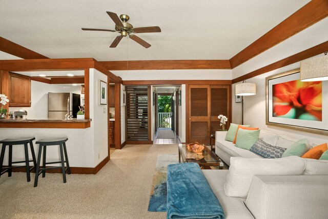 2253 Poipu Rd Unit 426, Koloa, HI 96756 - living area with a ceiling fan, light colored carpet, and baseboards