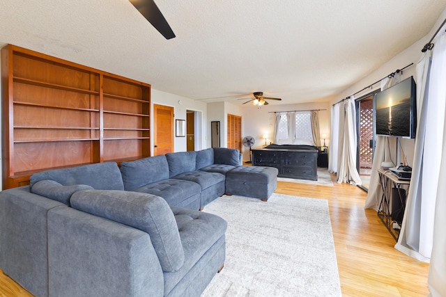 73-4327 Oneone St, Kailua-Kona, HI 96740 - living area featuring ceiling fan and light wood-style floors