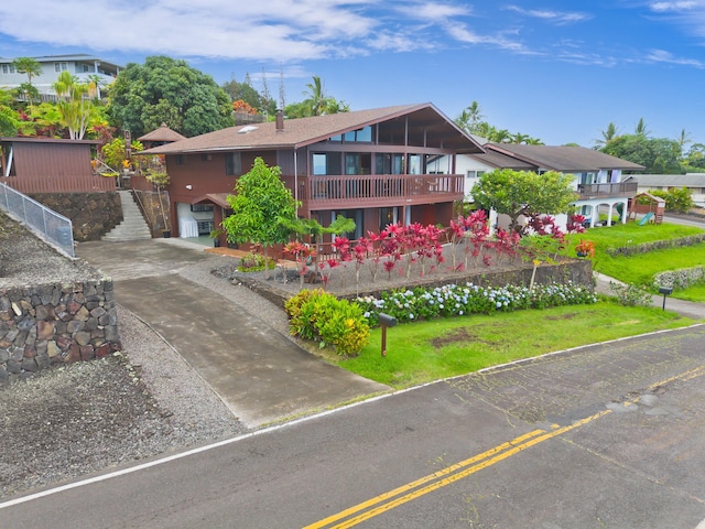 73-4327 Oneone St, Kailua-Kona, HI 96740 - view of front facade featuring an attached garage and concrete driveway