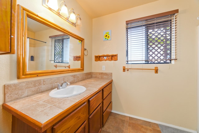73-4327 Oneone St, Kailua-Kona, HI 96740 - bathroom featuring vanity and baseboards
