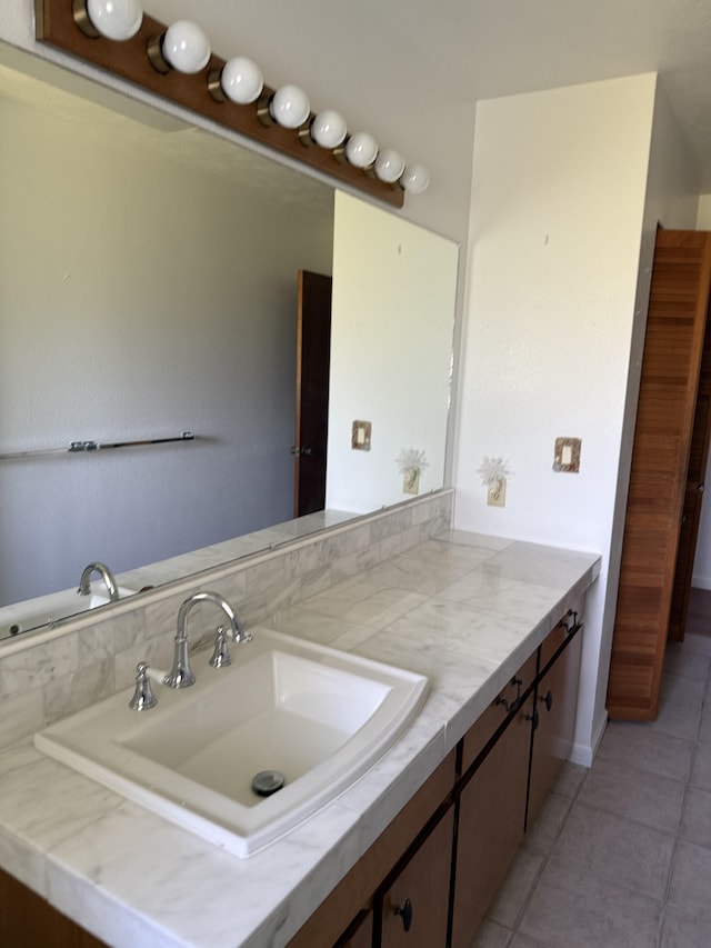 1572 Kaupili Pl, Hilo, HI 96720 - bathroom featuring tile patterned floors and vanity