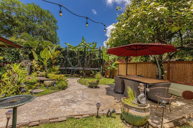 4030 Pauahi Pl, Princeville, HI 96722 - fenced backyard with a patio area