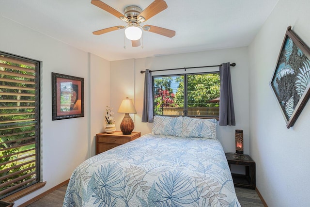 4030 Pauahi Pl, Princeville, HI 96722 - bedroom featuring wood finished floors, baseboards, and ceiling fan