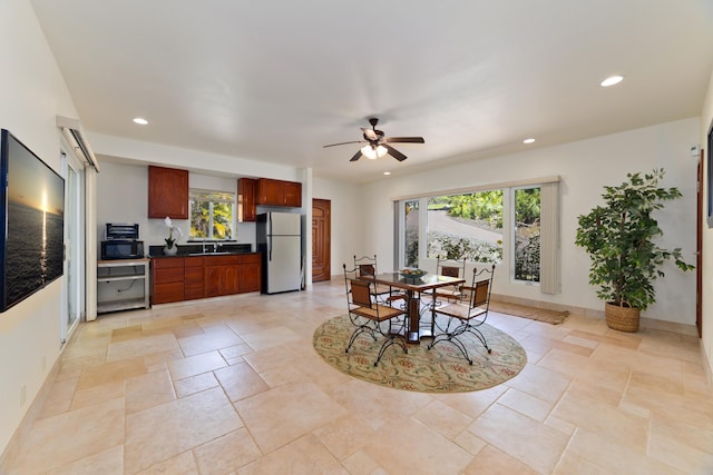 73-4558 Kukuki St, Kailua-Kona, HI 96740 - dining space featuring plenty of natural light, a ceiling fan, recessed lighting, and light stone finish flooring