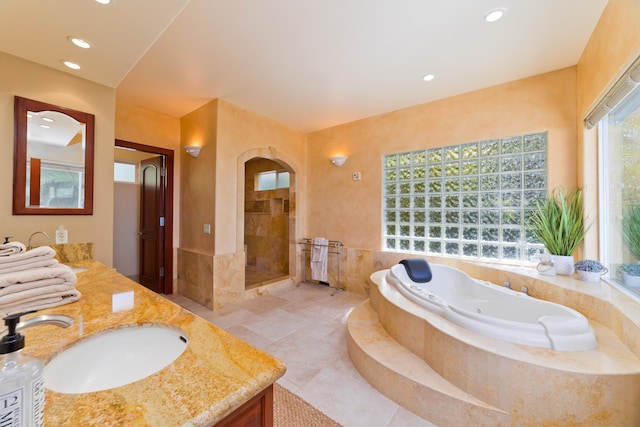 73-4558 Kukuki St, Kailua-Kona, HI 96740 - bathroom with a whirlpool tub, vanity, recessed lighting, tile patterned floors, and a stall shower