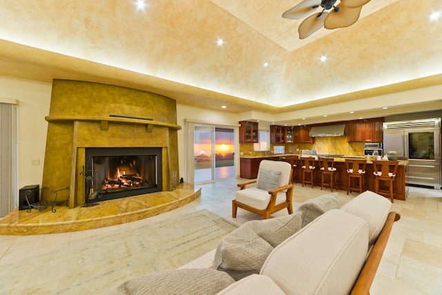 73-4558 Kukuki St, Kailua-Kona, HI 96740 - living room with recessed lighting, a ceiling fan, a large fireplace, and light tile patterned flooring