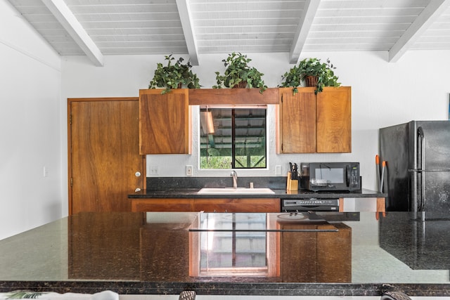 14-3531 Nanawale Blvd, Pahoa, HI 96778 - kitchen with black appliances, a sink, beam ceiling, brown cabinets, and dark stone counters