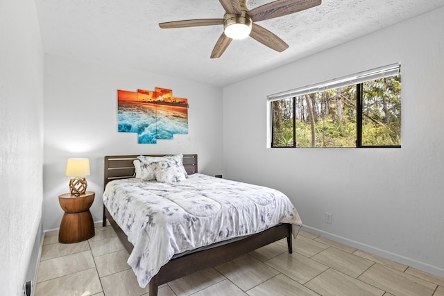 14-3531 Nanawale Blvd, Pahoa, HI 96778 - bedroom featuring baseboards, a textured ceiling, and a ceiling fan