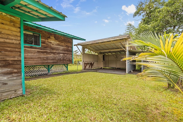 14-3531 Nanawale Blvd, Pahoa, HI 96778 - view of grassy yard with a carport