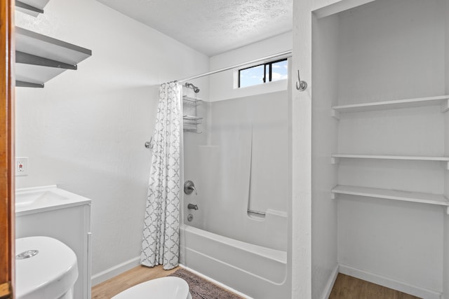 14-3531 Nanawale Blvd, Pahoa, HI 96778 - bathroom with toilet, shower / bath combo, wood finished floors, a textured ceiling, and baseboards